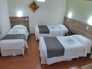 Postel nebo postele na pokoji v ubytování Hotel JB