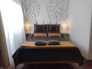 En eller flere senge i et værelse på Apartment City Heart