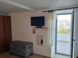 A television and/or entertainment centre at Soul Treatment Home