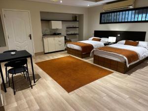 A bed or beds in a room at Rentrific