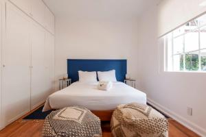 Ліжко або ліжка в номері Breezy 2BR in Polanco