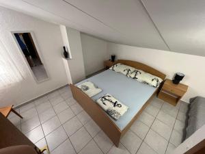 Postel nebo postele na pokoji v ubytování Apartment TinaTeo, Gajac