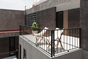 A balcony or terrace at Fancy and Modern 2BR Duplex in Roma Norte