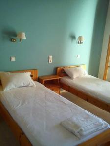 
Ένα ή περισσότερα κρεβάτια σε δωμάτιο στο Sofos Apartments
