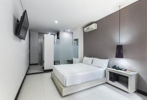 TV a/nebo společenská místnost v ubytování Hotel 47 Medellin Center