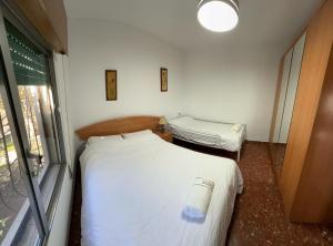เตียงในห้องที่ Villa Lazaro