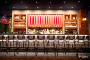 a bar with chairs in front of a bar at Westview Vacation Rental - Two BR House in North Vancouver