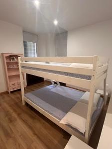 a room with two bunk beds in it at Step by Rome apt in Rome
