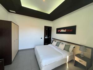 Letto o letti in una camera di Boteco B&B