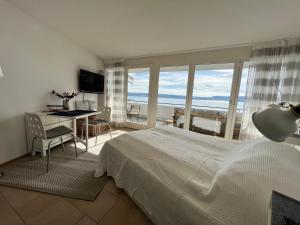 Ένα ή περισσότερα κρεβάτια σε δωμάτιο στο Kleines Seeapartment