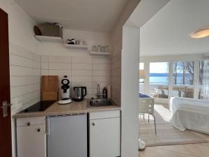 Η κουζίνα ή μικρή κουζίνα στο Kleines Seeapartment
