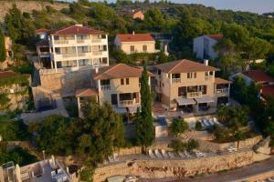 an aerial view of a house in a village at Premium OAZA in Primošten