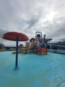 a water park with a ride in the water at A22 Holiday Resort Unity Brean Passes Included Sleeps 8 people 3 bedrooms No pets in Berrow