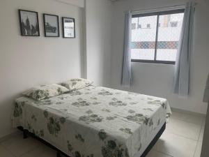 Ένα ή περισσότερα κρεβάτια σε δωμάτιο στο Apartamento Moderno e Tranquilo +27 φωτογραφίες