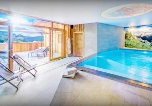 a large swimming pool in a house at Chalet Caramel - Les Congères in Manigod