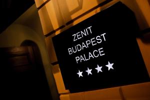 a sign on a building that reads zent browser palace at Hotel Zenit Budapest Palace in Budapest