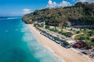 an aerial view of a beach with a resort and the ocean at Sweet Healing Culture in Ungasan