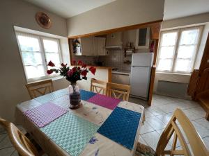 A kitchen or kitchenette at Gîte Taintrux, 4 pièces, 5 personnes - FR-1-589-261