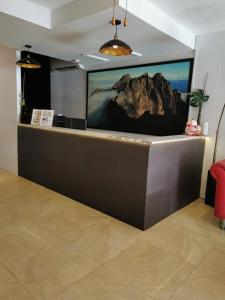 Μια τηλεόραση ή/και κέντρο ψυχαγωγίας στο KINGSMAN BOUTIQUE HOTEL