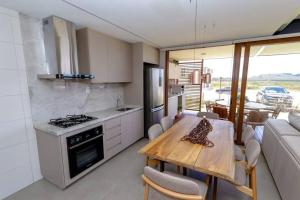 A cozinha ou cozinha compacta de Casa 19 da Vila Beija Flor
