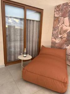Cama ou camas em um quarto em Casa 19 da Vila Beija Flor