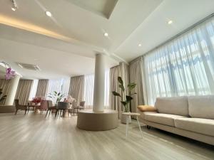 Χώρος καθιστικού στο Asimmy Hotel