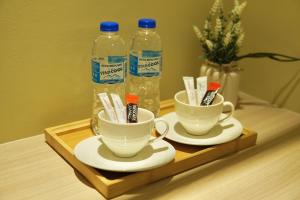 Nápoje v ubytování Asimmy Hotel