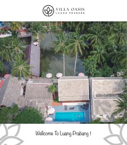an overhead view of a resort with palm trees at Luang Prabang Villa Oasis in Luang Prabang