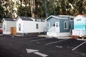 a row of mobile homes in a parking lot at 2-Bedroom SLO Bungalow House in San Luis Obispo