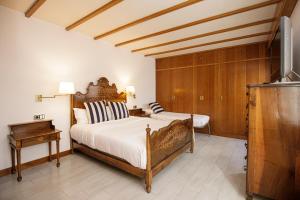Posteľ alebo postele v izbe v ubytovaní Hotel Casa Mas