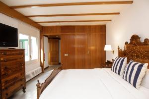 Posteľ alebo postele v izbe v ubytovaní Hotel Casa Mas