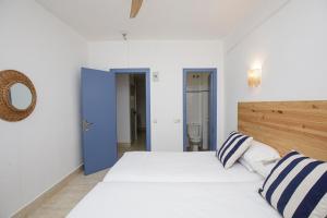 Posteľ alebo postele v izbe v ubytovaní Hotel Casa Mas