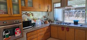 Kuchyň nebo kuchyňský kout v ubytování Pakin house