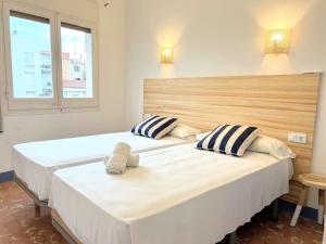 Posteľ alebo postele v izbe v ubytovaní Hotel Casa Mas