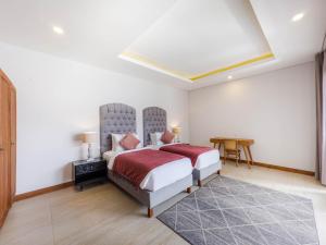 Ένα ή περισσότερα κρεβάτια σε δωμάτιο στο Skyla Villa Ubud by Supala +36 φωτογραφίες