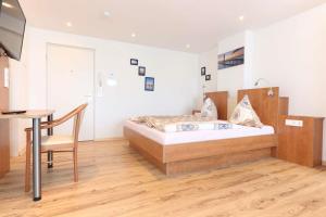 Ένα ή περισσότερα κρεβάτια σε δωμάτιο στο Apartment Deichstraße