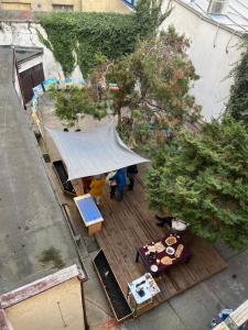 an overhead view of a wooden deck with a canopy at Vysoká Apartman EMF/STP in Bratislava