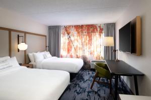 Postel nebo postele na pokoji v ubytování Fairfield Inn & Suites by Marriott Denver Southwest/Lakewood