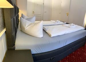 Postel nebo postele na pokoji v ubytování Hotel Carl von Clausewitz