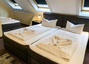 Postel nebo postele na pokoji v ubytování Hotel Carl von Clausewitz