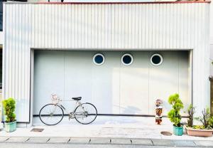 a bike parked in front of a garage at Villa Inuyama - Vacation STAY 87603v in Inuyama