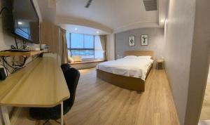 TV o dispositivi per l'intrattenimento presso Meworld Hotel - Zhongshan