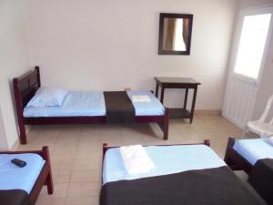 Letto o letti in una camera di Hotel Joohn Gay only LGBTIQ