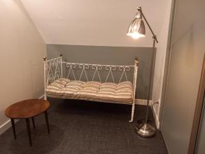 Atpūtas zona naktsmītnē Room in Guest room - Chaleureux refuge a Meursault Detente et confort assures