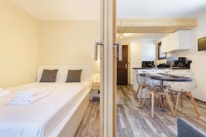 Posteľ alebo postele v izbe v ubytovaní Hameau Des Grands Montets - Apartment 127 - Happy Rentals