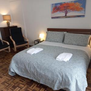 Llit o llits en una habitació de Sweet Home in Torino Cenisia