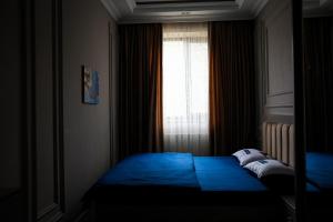 Postel nebo postele na pokoji v ubytování Learmara Apartment #1