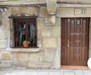 The facade or entrance of A Casiña de Juan
