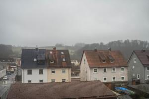 een groep huizen en daken in een stad bij Ferienwohnung 2 in Bad Lauterberg