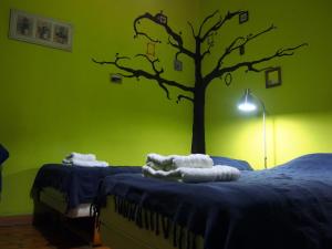 Postel nebo postele na pokoji v ubytování Guest Accommodation Etno Konak Tašana